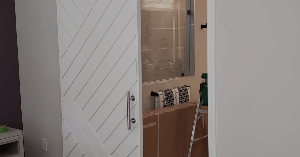 Custom chevron-pattern sliding barn door